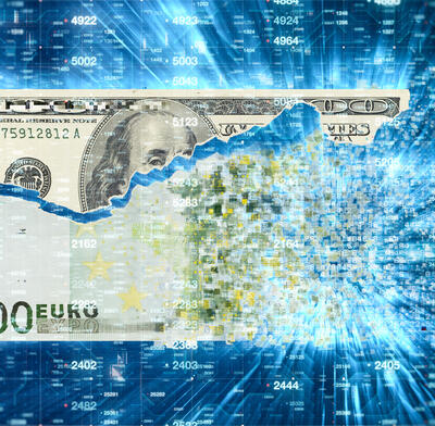 US dollar bill & euro note broken down the middle