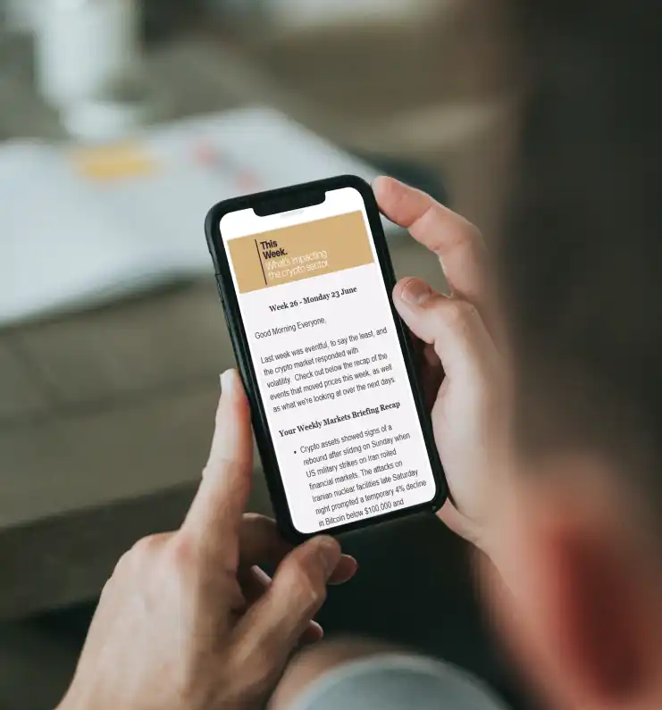 Person reading the Sandmark newsletter